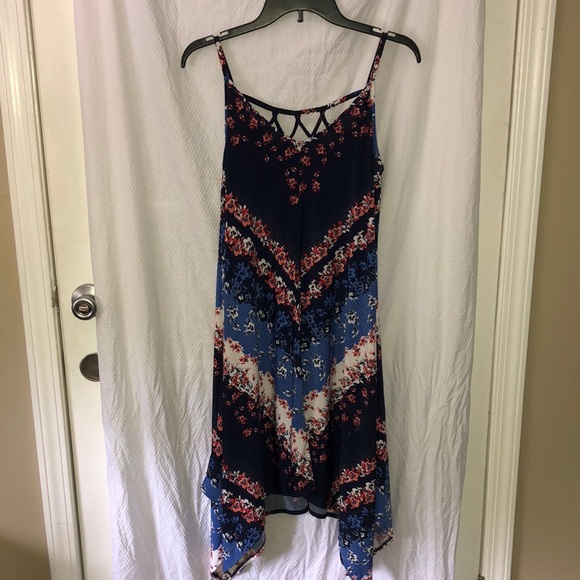 Maurices Dresses & Skirts - Floral Dress in a size Medium with back and angular detailing